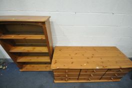 A MODERN LOW PINE BANK OF NINE DRAWERS, length 151cm x depth 59cm x height 58cm, along with a pine