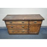 A VICTORIAN STAINED PINE SHOPCOUNTER, with a single drawer above a cupboard door besides three