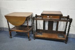 AN EARLY 20TH CENTURY OAK BARLEY TWIST UMBRELLA STAND, with a single drawer, and two tray inserts,