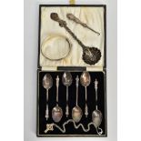 A SELECTION OF SILVER ITEMS, to include a cased set of six silver apostle teaspoons, each hallmarked