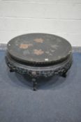 A CHINESE EBONISED CIRCULAR OCCASIONAL TABLE, with chinoiserie decoration, with folding legs,