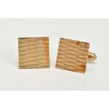 A PAIR OF 9CT GOLD CUFFLINKS, each of a square form designed with a diamond cut pattern,