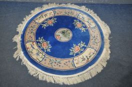 A WOOLLEN CHINESE CIRCULAR RUG, diameter 130cm