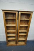 A PAIR TALL SLIM PINE OPEN BOOKCASES, width 59cm x 25cm x height 184cm (condition:-minor surface