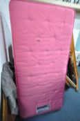 A SLEEPMASTER PINK COLOURED SINGLE MATTRESS