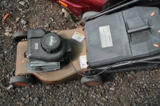 A BRIGGS AND STRATTON PETROL LAWNMOWER, with grass box (engine not turning)