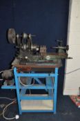 A VINTAGE MYFORD METAL WORKING LATHE with a 17in bed, belt drive by motor on separate frame,