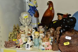 A MIXED QUANTITY OF ROYAL DOULTON FIGURINES 'BUNNYKINS' ETC, a toby jug, a carved wooden Buddha