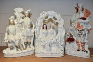 THREE VICTORIAN STAFFORDSHIRE POTTERY FLAT BACK FIGURE GROUPS, comprising a male bag pipe player