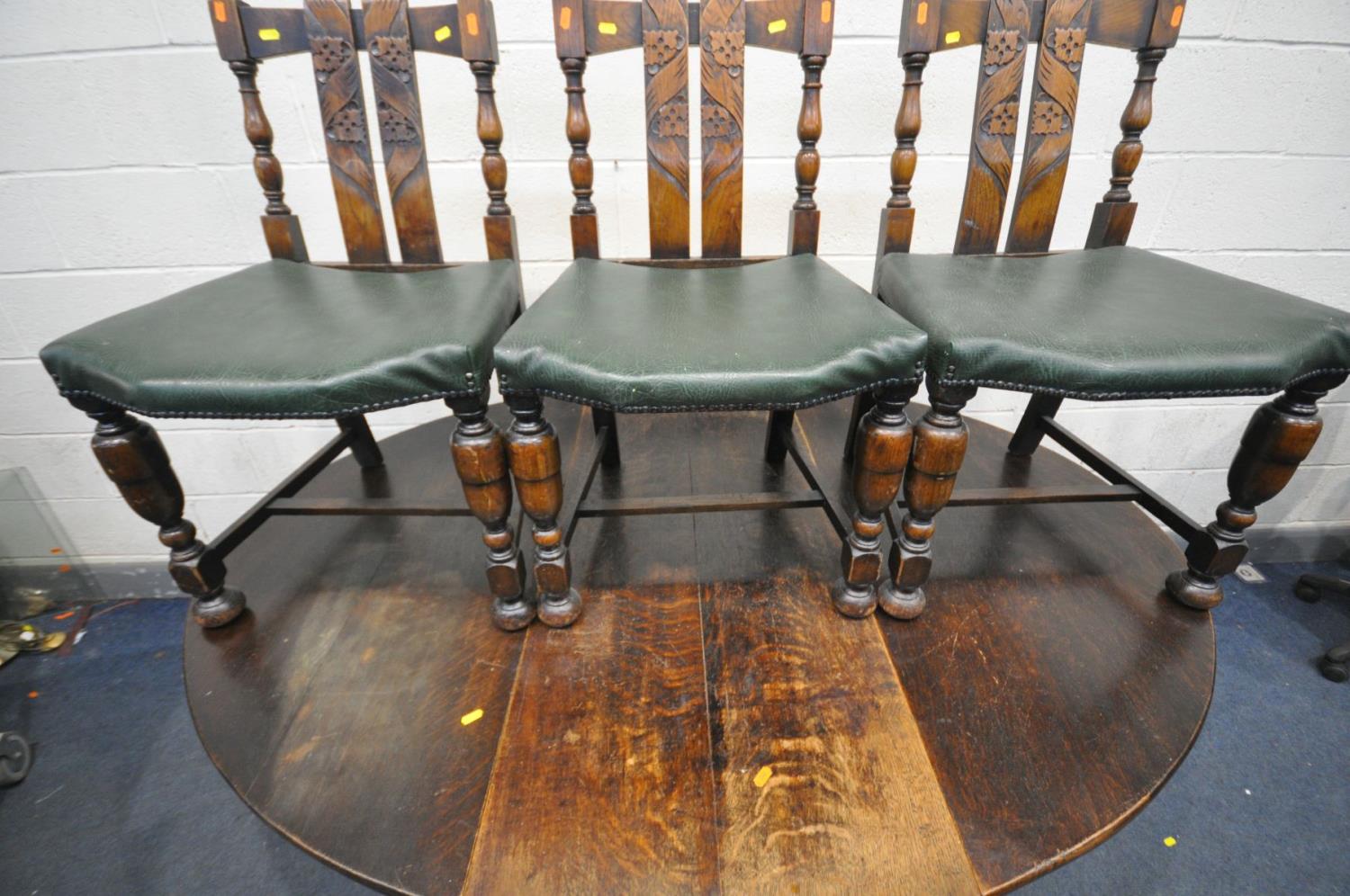 A GEORGIAN AND LATER OAK GATE LEG TABLE, with , turned cylindrical legs, united by stretchers,