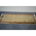 A G H FRITH WOOLEN INDU ZEIGLER GOLD AND ROSE CARPET RUNNER, 240cm x 75cm (condition:-some minor