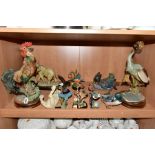 A GROUP OF RESIN BIRD AND ANIMAL FIGURES, most having wooden bases to include a Breed Apart