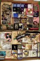 TWO BOXES OF ASSORTED COSTUME JEWELLERY, to include pieces such as yellow and white metal costume