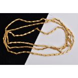 A YELLOW METAL CHAIN, designed as a plain polished hayseed link chain, with S-shape hook clasp,