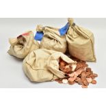 A HEAVY BOX OF COINS FROM 1967, to include two bags of uncirculated 1p coins in £5 bags, and two