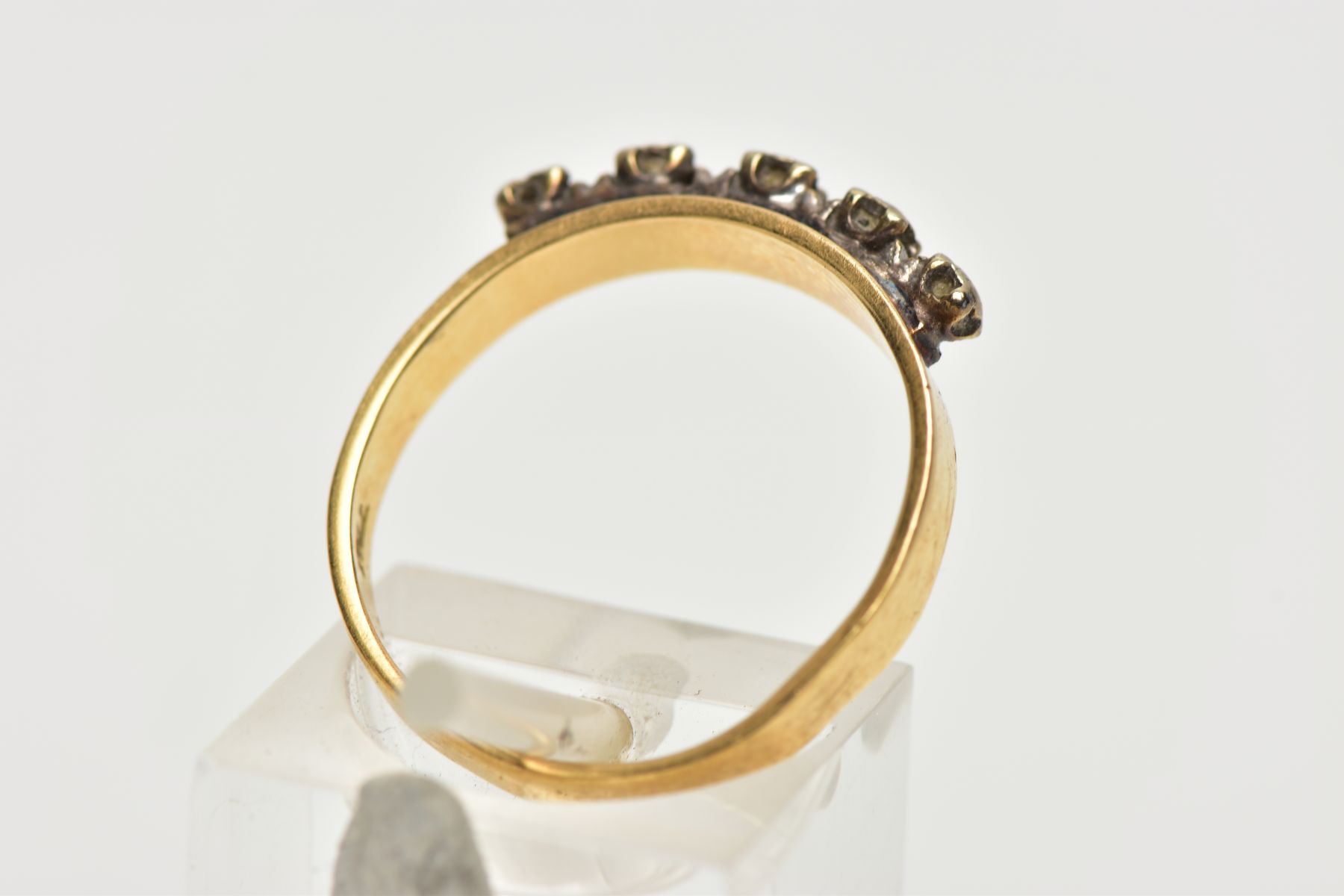 A YELLOW METAL DIAMOND HALF ETERNITY RING, the three illusion set diamonds to the metal capped sides - Image 3 of 4