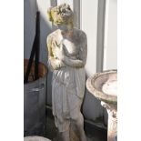 A COMPOSITE GARDEN FIGURE, of a standing scantily clad lady, in flowing robes, height 119cm