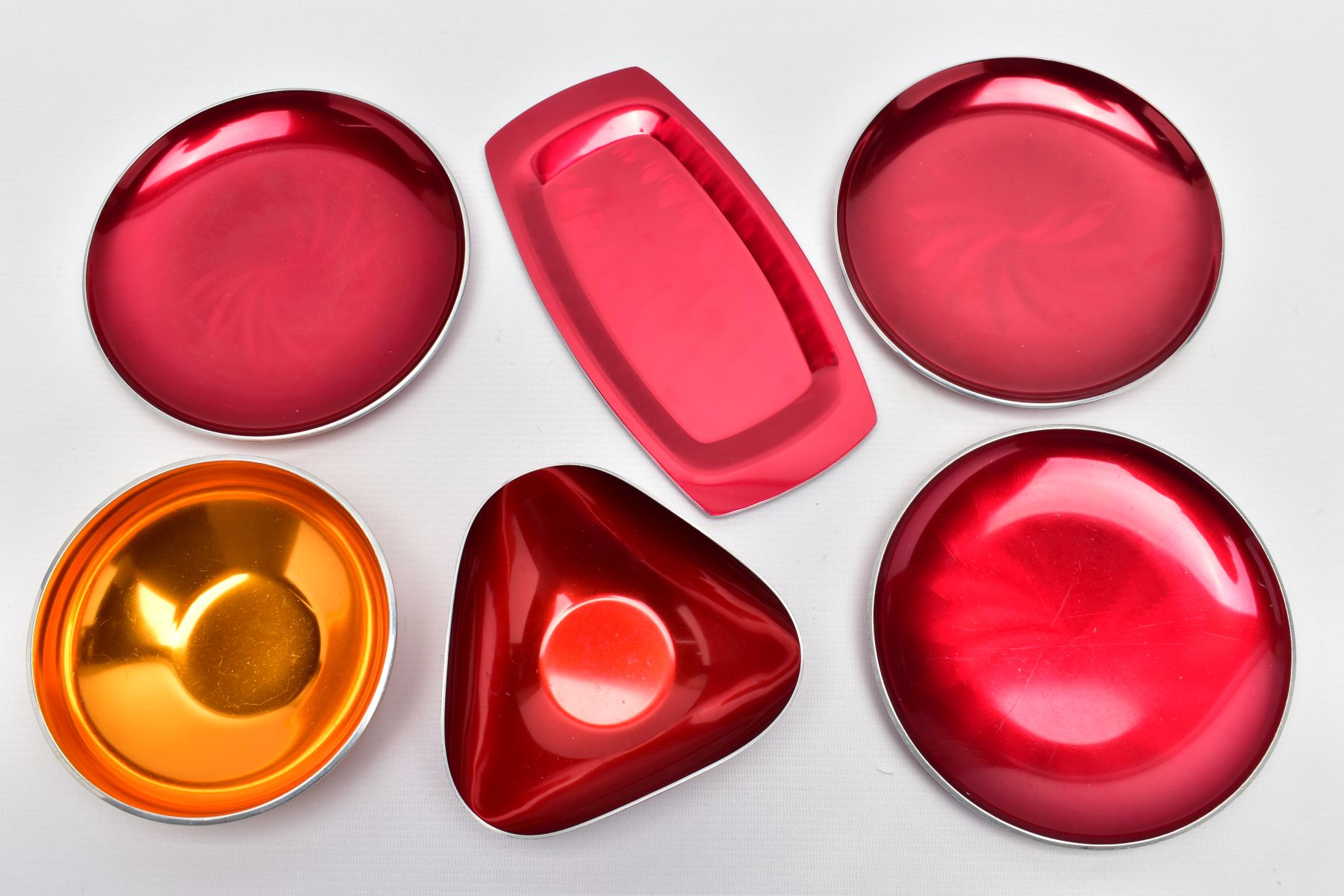 VINTAGE ANODISED NORWEGIAN METAL WARES, comprising three Olden of Norway red dishes, approximate