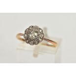 A YELLOW METAL OLD CUT DIAMOND CLUSTER RING, the old cut diamond with similar cut diamond