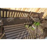 TWO VARIOUS STAINED WOOD GARDEN BENCHES, max length 159cm, an armchair and a slatted coffee table (