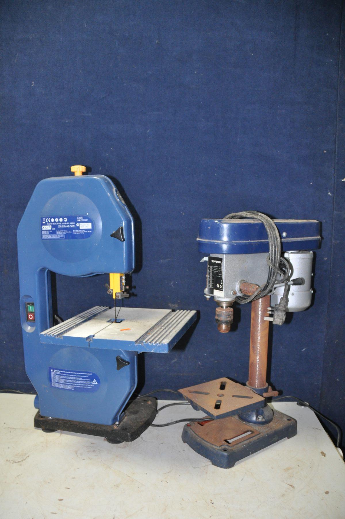 A POWER CRAFT M1A190 band saw along with a pillar drill (no branding visible) model No WPPD350 (both