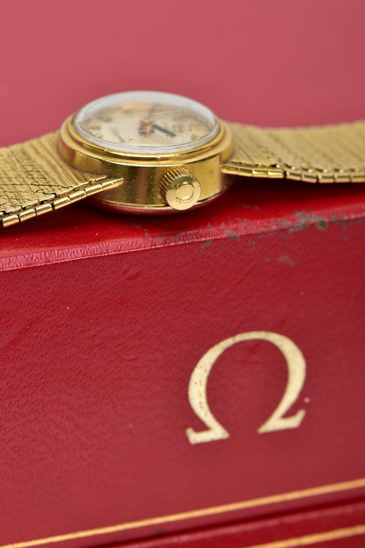 A LADIES 9CT GOLD 'OMEGA' WRISTWATCH, a hand wound movement, round silver tone dial signed 'Omega - Bild 5 aus 6