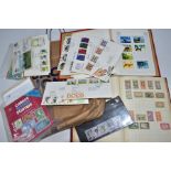BAG OF STAMPS with a small range of loose GB FDCs, an album of mainly 1930s/40s mint and used with