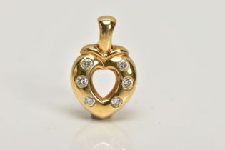 A YELLOW METAL DIAMOND HEART PENDANT, an openwork heart shape pendant set with six brilliant cut