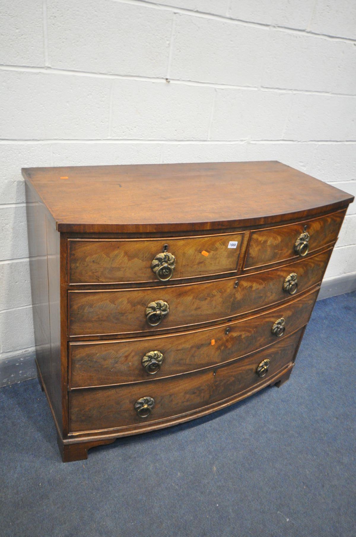 A GEORGIAN FLAME MAHOGANY BOWFRONT CHEST OF TWO SHORT AND THREE LONG DRAWERS, with brass circular - Image 2 of 5