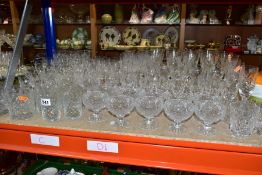 A QUANTITY OF CUT GLASS DRINKING GLASSES, twelve sets/part sets of glasses with some pairs and