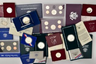 A SMALL CARDBOARD BOX CONTAINING MOSTLY USA SILVER PROOF COINS, to include two 1991 Korean war