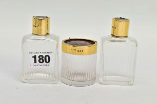 A SET OF THREE EARLY 20TH CENTURY GUILTED SILVER AND TORTOISESHELL GLASS BOTTLES, each hallmarked