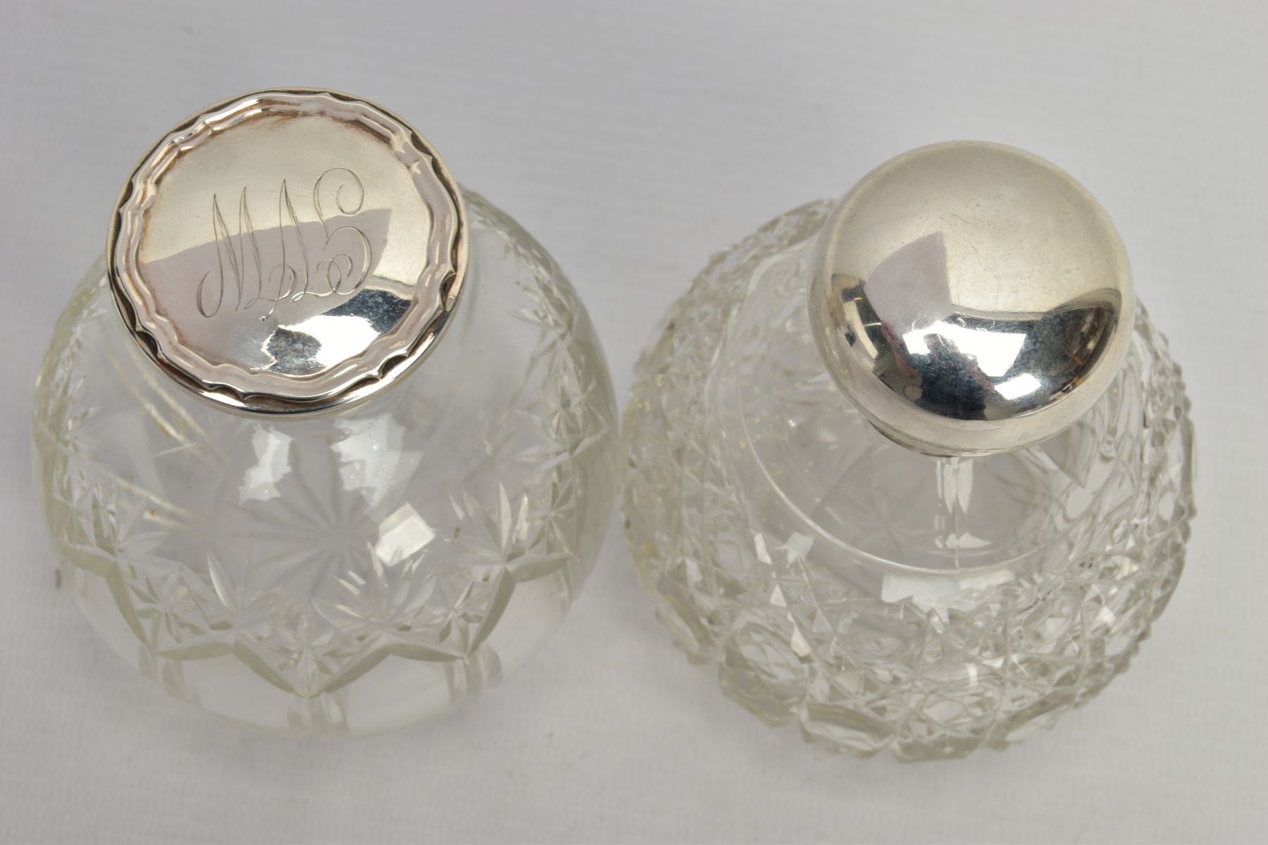 TWO GLASS SILVER TOPPED PRESSED BOTTLES, each designed as a rounded glass bottle with silver tops - Bild 2 aus 5