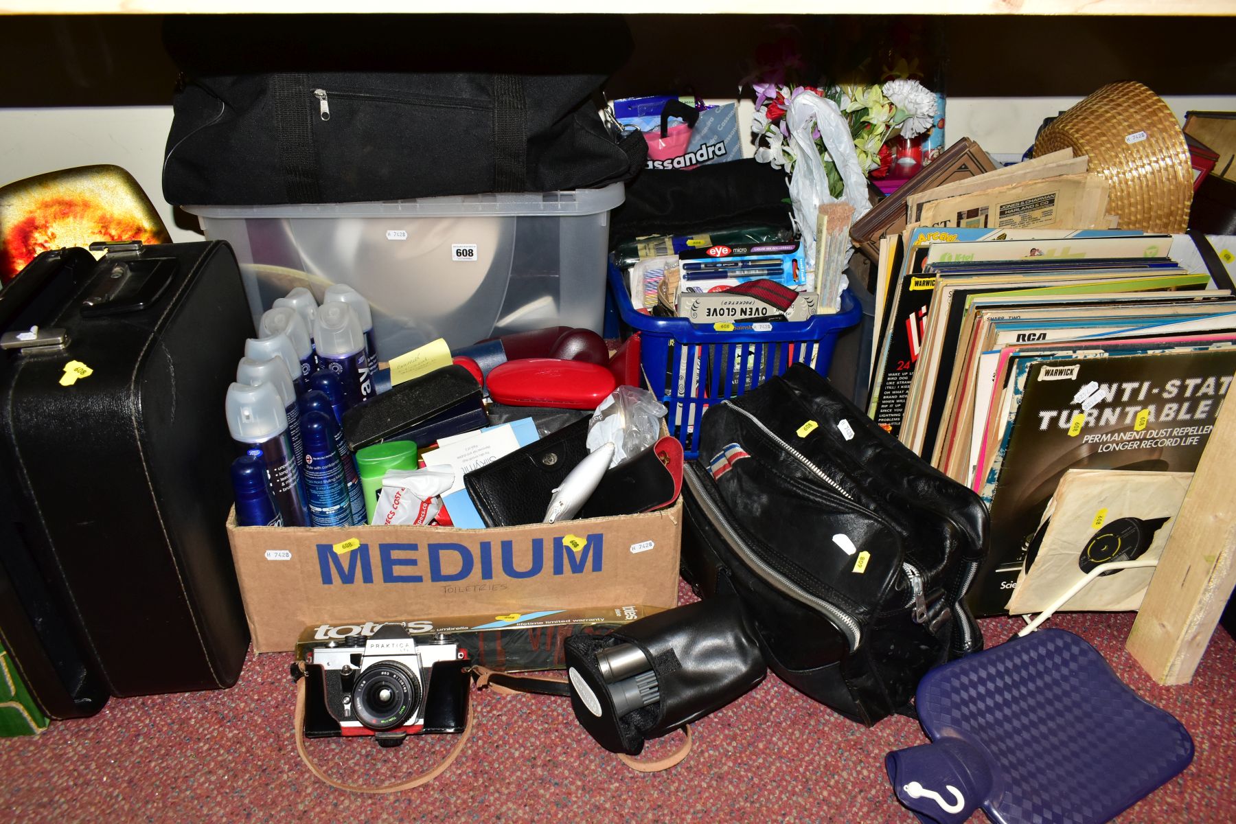 AN ERIKA TYPEWRITER IN CARRYCASE AND FIVE BOXES OF VARIOUS ITEMS including three Garnier antiwrinkle