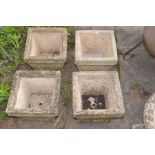 A SET OF FOUR COMPOSITE SQUARE TAPPERED PLANTERS, all stamped Cotswold studio, with decorated sides,