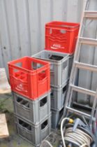 TEN PLASTIC BOTTLE CRATES, to include two Coca-Cola, seven Corona and one Masons