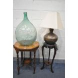 AN EDWARDIAN WALNUT CENTRE TABLE, 58cm x height 75cm, a demijohn, a mahogany torchere stand and a