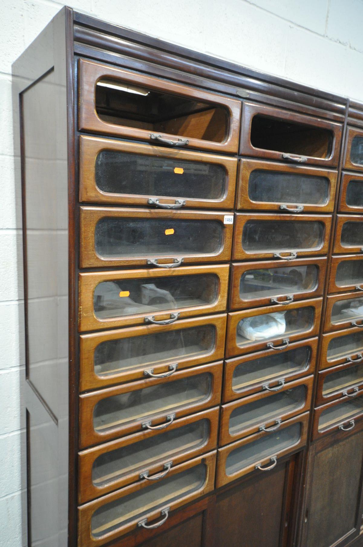 A PAIR OF EARLY 20TH CENTURY MAHOGANY HABERDASHERY CABINETS, made up of sixteen glass fronted - Bild 3 aus 6