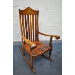 A MID TO LATE 20TH CENTURY HARDWOOD AND BRASS INLAID ROCKING CHAIR