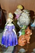 A SMALL GROUP OF FIGURINES, ANIMAL AND BIRD FIGURES, comprising a Carlton Ware Guinness zookeeper