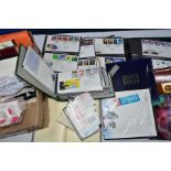 COLLECTION OF STAMPS in a box with GB FDCs and mint GB in packets and yearbooks providing good