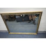 A LARGE RECTANGULAR GILT WOOD BEVELLED EDGE WALL MIRROR, length 131cm x height 102cm (good