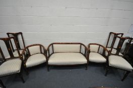 AN EDWARDIAN MAHOGANY SEVEN PIECE PAROLUR SUITE, comprising a sofa with open armrests, length