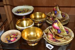 A GROUP OF AYNSLEY ORCHARD GOLD, comprising a set of four cabinet tea cups and saucers with two