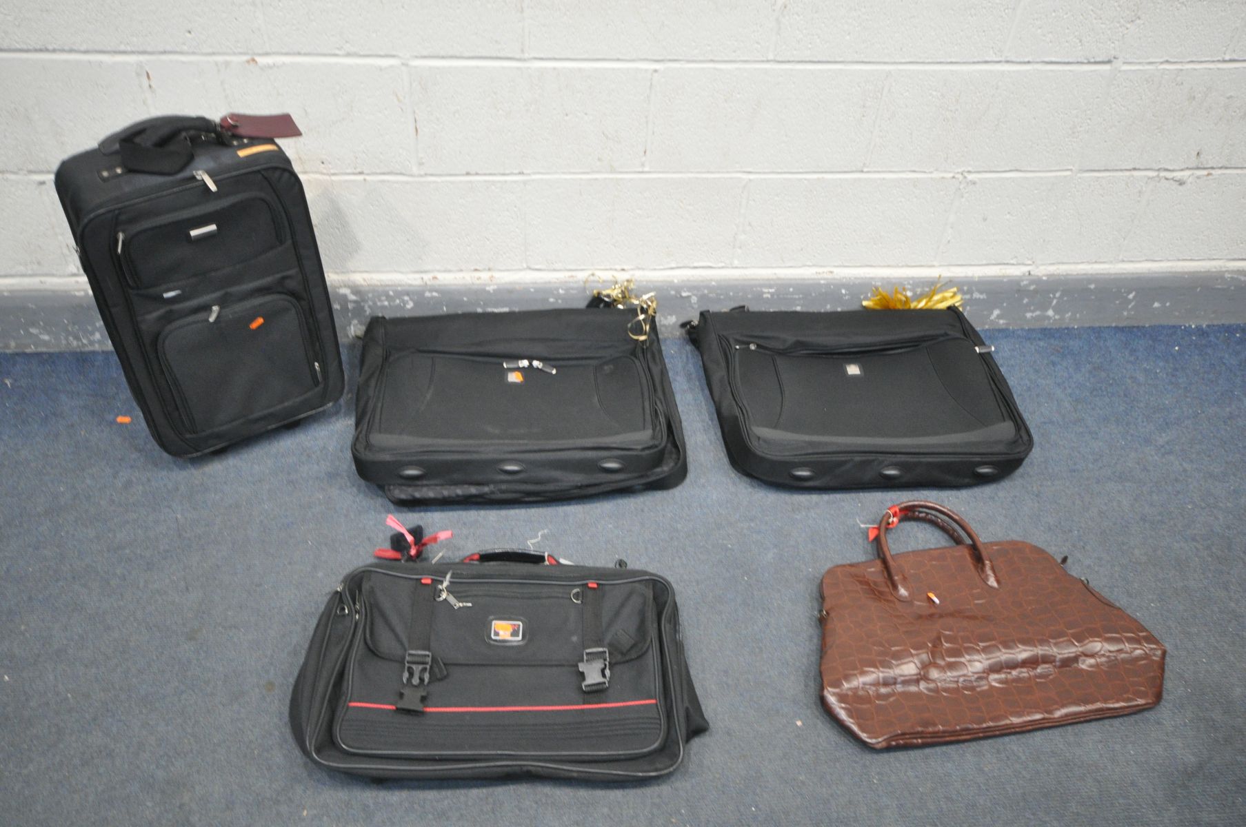 A SELECTION OF LUGGAGE, to include two garment bags, a holdall bag and two hand luggage bags (5)