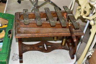 AN EARLY TWENTIETH CENTURY GLOCKENSPIEL, constructed in brass on a wooden frame with fretwork lyre