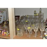 FIVE SETS OF DRINKING GLASSES, in sets of six or more, a large glass fruit bowl, two decanters,