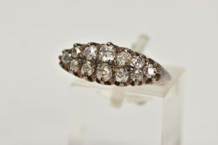 AN OLD CUT DIAMOND DRESS RING, the graduated old cut diamond rows, with openwork gallery and tapered