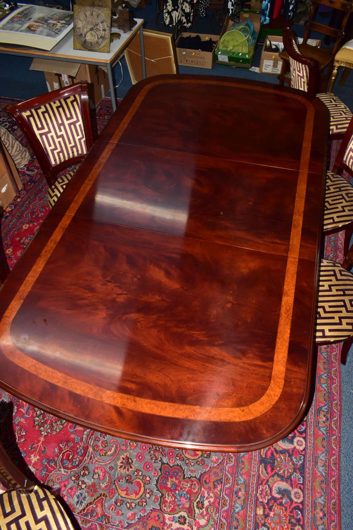 A CHARLES BARR MAHOGANY AND BURR WOOD INLAID EXTENDING PEDESTAL DINING TABLE, with one additional - Image 12 of 19