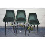 THREE GREEN VELVET BAR STOOLS, on metal legs, two at 109cm x one at 97cm (condition - some marks